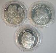 3 Diff. 1 Troy Oz pure .999 fine Silver Christmas medallions in plastic