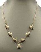 10kt Yellow gold black star sapphire cab and ruby necklace