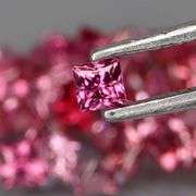 Exquisite 2.56ct set of rare pink Malaya Garnets