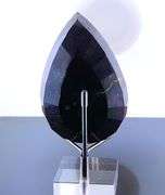 Holy cow! It's a 1,374ct Ruby in Matrix! With a stand!