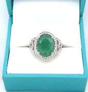 Darling 8.63CTS Oval Faceted Natural Emerald & 1.22 White Sapphire Ring in Sterling Silver