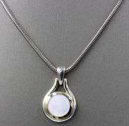 Tiffany & Co 2 tone mother of pearl pendant on snake chain