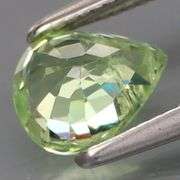 What are we looking at here?!? It's a rare 1.11ct  green Malaya Garnet!