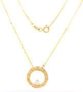 14kt Yellow gold 0.15ctw white and yellow diamond circle pendant on chain