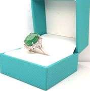 Sparkling 8.63CTS Oval Faceted Emerald & 1.11CTW White Sapphire Ring in Sterling Silver