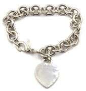 Tiffany & Co link bracelet with heart shaped charm