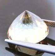 Intricately cut! 19.61ct REAL Imperial Topaz!