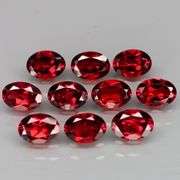 Outstanding color! 9.49ct real pinkish red Garnet set!!