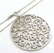 Tiffany & Co Enchant circle pendant on chain