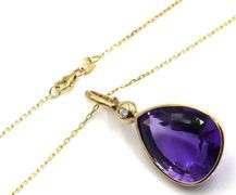 14kt Yellow gold pear shaped amethyst and bezel set diamond enhancer pendant on chain