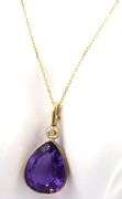 14kt Yellow gold pear shaped amethyst and bezel set diamond enhancer pendant on chain