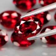 Outstanding color! 9.49ct real pinkish red Garnet set!!