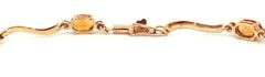 14kt Yellow gold oval citrine woven link station bracelet