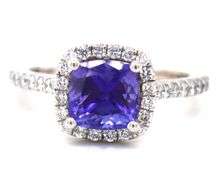 14kt White gold cushion cut Tanzanite and diamond halo ring