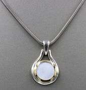 Tiffany & Co 2 tone mother of pearl pendant on snake chain