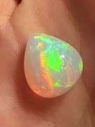 Magnificent 6.42ct full body rainbow chaff flashing Welo Opal