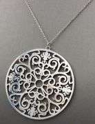 Tiffany & Co Enchant circle pendant on chain