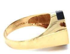 18kt Yellow gold black onyx and diamond gent's ring