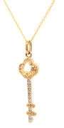 14kt Two tone gold diamond key pendant on chain