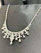 Most Beautiful bridal necklace in sterling silver and Dancing Swarovski center.