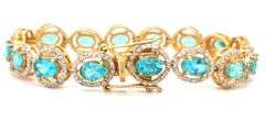 Mesmerizing 11.80CTW Oval Shaped Faceted Apatite & 2.10CTW Diamond Bracelet in 14K Yellow Gold Over 