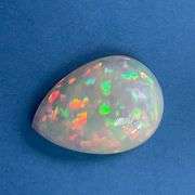 NATURAL OPAL - 14.4 CARATS PEAR CABOCHON CUT