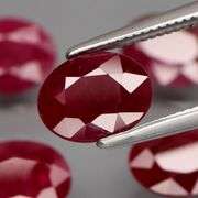 Deep color in this heavy 7.28ct Violet red Ruby set!!!