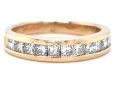 Glittering 14K YG Band with Channel Set Princess Cut Diamonds