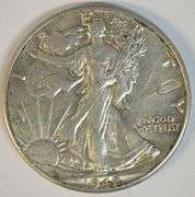 Upper end 1942 Walking Liberty Half Dollar with obverse lamination error