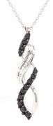 10kt White gold black and white diamond twisted pendant on chain