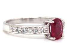 10kt White gold 0.60ct oval ruby and diamond ring
