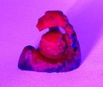 Simply adorable! 77.91ct Ruby in Zoisite owl carving!