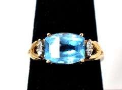Elegant 10K Yellow Gold Blue Topaz Gemstone Ring with Diamond Accents