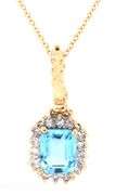 14kt Yellow gold Emerald cut blue topaz and diamond halo enhancer pendant on chain