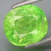 It's a rare 3.70ct Malaya Garnet! And it's GREEN!