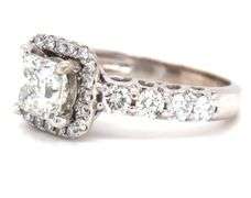 14kt White gold 1ct princess cut in 0.50ctw diamond halo diamond shank setting