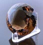 It's a big boy! 206.97 top color Smoky Quartz!