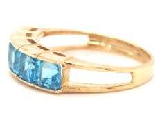 14kt Yellow gold channel set princess cut blue topaz five stone band