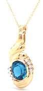 14kt Yellow gold oval London topaz and diamond enhancer pendant on chain