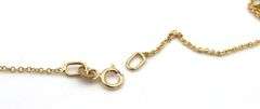 14kt Yellow gold Trillion garnet and channel set diamond slide pendant on chain