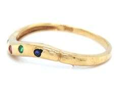 18kt Yellow gold Scatter ruby, sapphire, emerald and diamond curved band