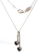 10kt White gold double heart sapphire and diamond bar pendant