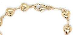 14kt Yellow gold puffed heart station link bracelet