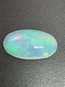 NATURAL OPAL LOOSE-7.48 CARATS OVAL CABOCHON CUT