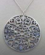 Tiffany & Co Enchant circle pendant on chain