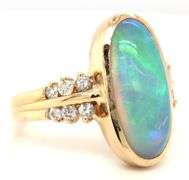 14kt Yellow gold doublet oval opal and diamond ring
