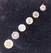 Graduated! 6 piece set of champagne diamonds weighing .44 carats!