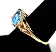 Elegant 10K Yellow Gold Blue Topaz Gemstone Ring with Diamond Accents