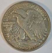 Upper end 1942 Walking Liberty Half Dollar with obverse lamination error