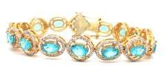 Mesmerizing 11.80CTW Oval Shaped Faceted Apatite & 2.10CTW Diamond Bracelet in 14K Yellow Gold Over 
